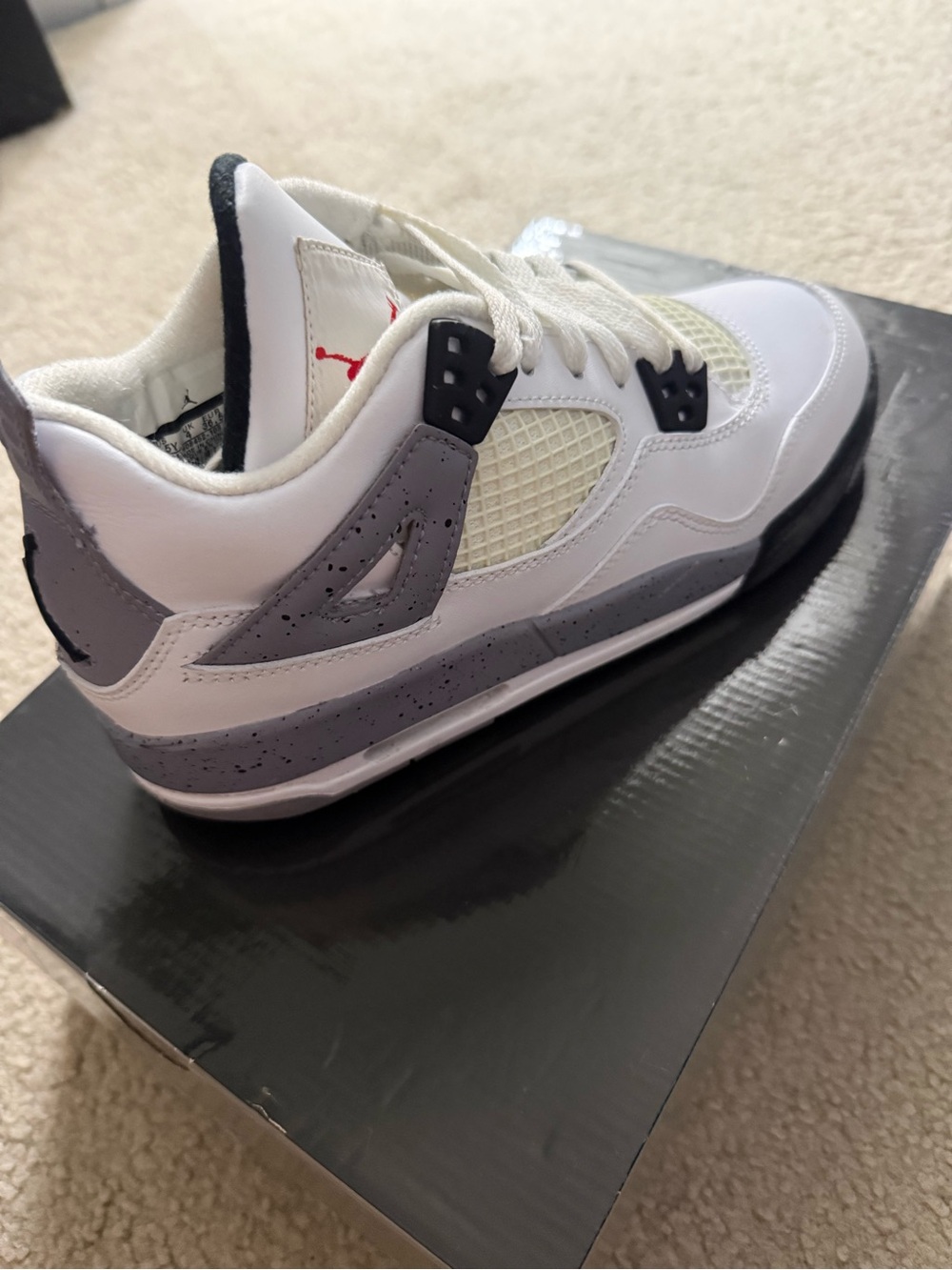 Jordan Air Jordan 4 Retro in White, Black, Grey